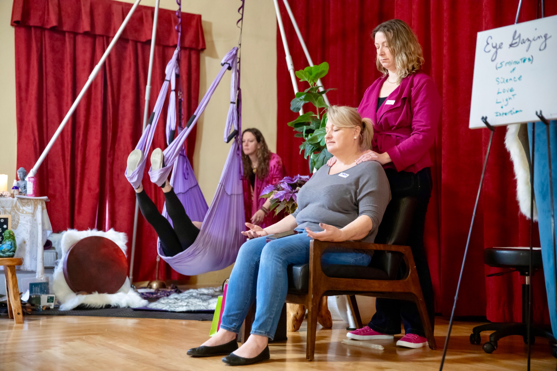 Energy healing session with aerial hammocks during the gathering