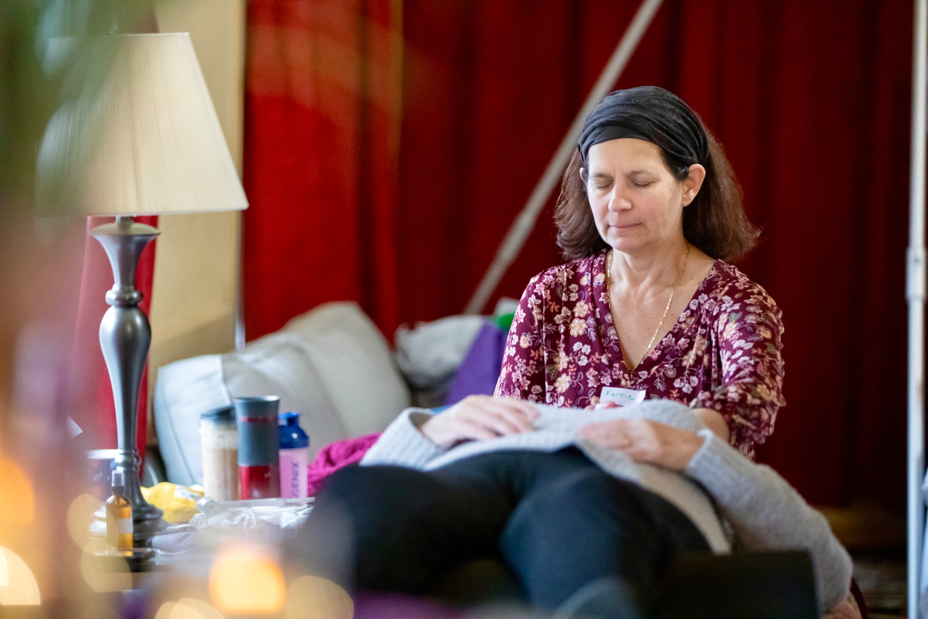 A practitioner offering a quiet hands-on healing session